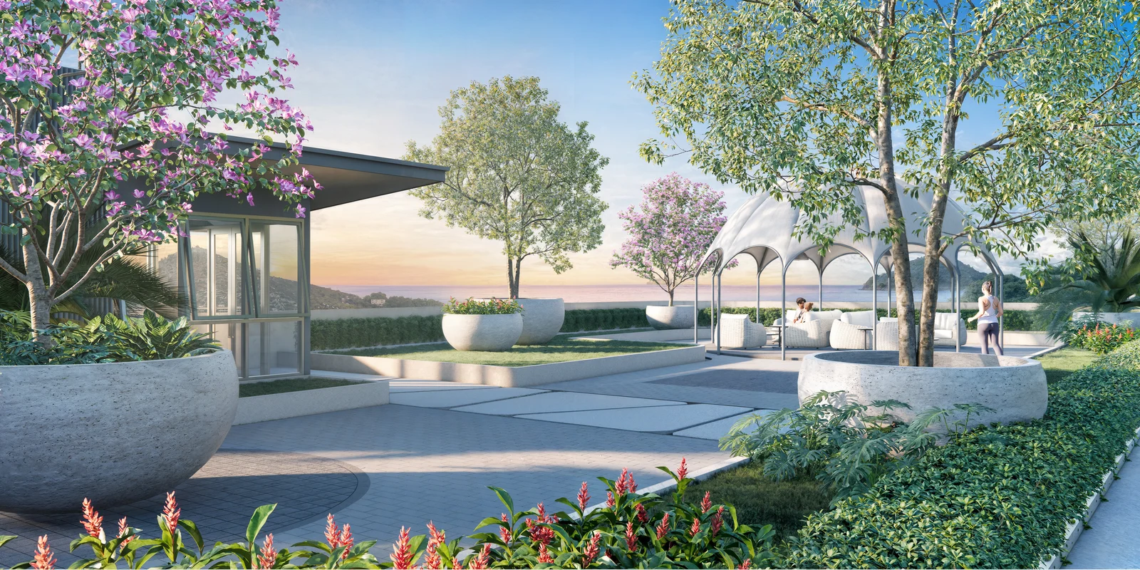 Arrival plaza with shade domes and sea-view seating at sunset