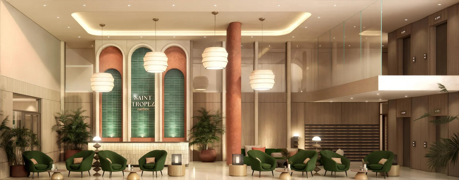 Double-height lobby with Saint Tropez signage wall